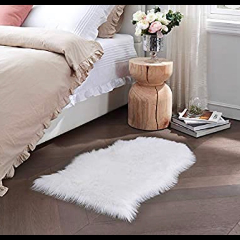 White faux bear skin rug